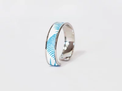 Manchette en acier et cuir imprimé jungle-Pau de Cuir-Pau-Maroquinerie artisanale