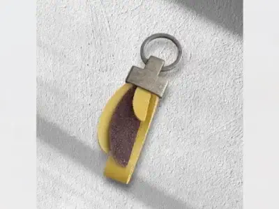 Porte-clés Plume en cuir upcyclé jaune et brun pailleté-Pau de Cuir-Pau-Maroquinerie artisanale